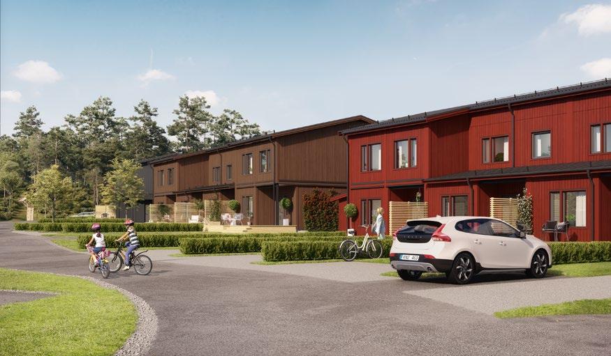Placeringen av husen skapar ett välkomnande kvarter där fasadernas jordnära färgsättning passar fint in i landskapet.