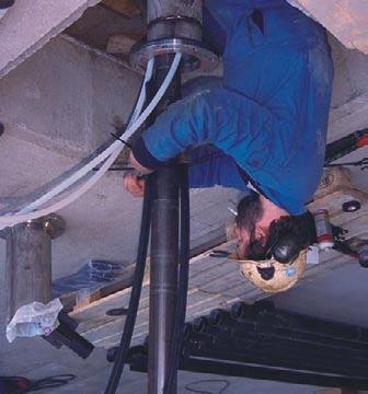 Storage and discharge of return water for KFM12A At the surface level, the return hose was connected to a return pipe between the discharge head and the first return water container, see Figures 3-3