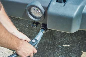 Hooking Up Tow Bar to Baseplate 1. Insert pull tab into baseplate pull socket with the flat spot and locking hole facing up.