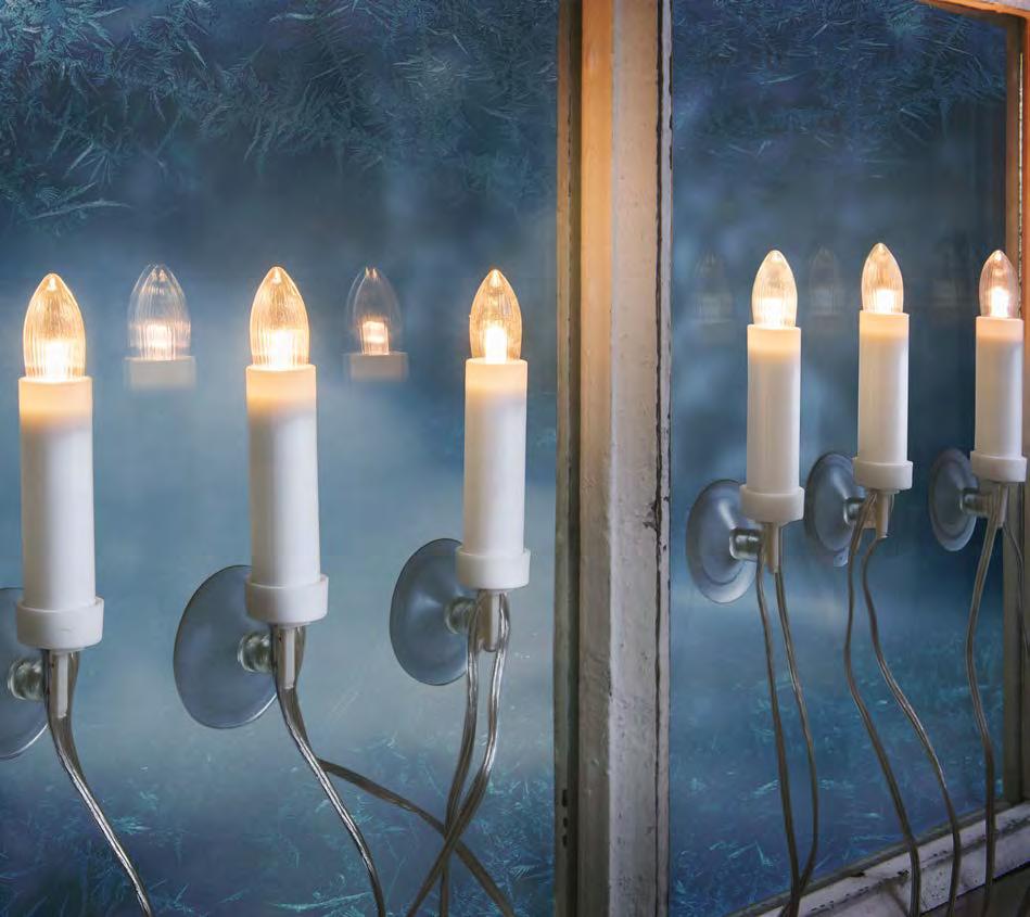 Varmgula -lampor, utbytbara, parallellkopplade. Reservlampans nr: 9477325. Genomskinlig sladd. WINDOW SET A set of window lights with suction cups, 6 candles.