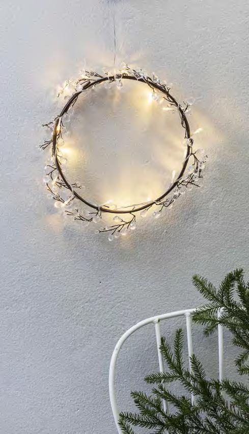 WREAT A wreath with clear crystal decorations on pliable brown branches. warm white, non-replaceable.
