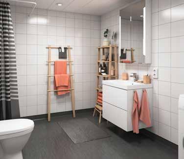 ) badrummet som har tvättmaskin och är förberett för torktumlare. Här finns även plats för badkar. Ett vitt IKEA kök som rymmer många middagsgäster.