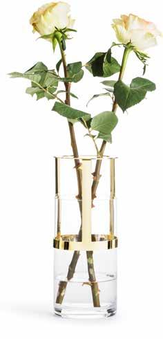Vasens höjd går att justera genom att flytta upp eller ner den guldfärgade
