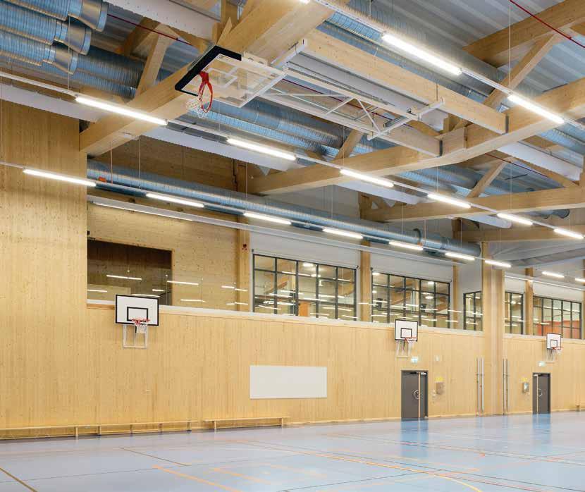 MORÖ BACKE SKOLA En F-9 skola och sporthall i Skellefteå med upp- och nedvänt sadelfackverk och KL-trä i väggarna.