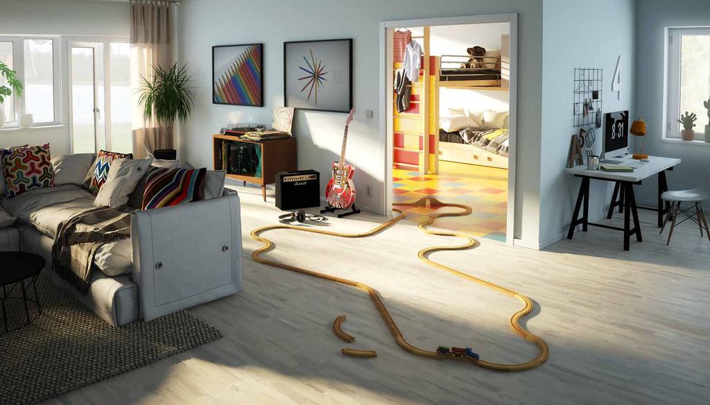 Våga visa personlighet i färg och form Golvet i vardagsrummet i denna moderna lägenhet är trestavsparkett i det hårda
