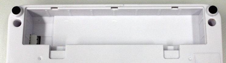 Isättning av batterier: Ta ut batterifackets lock.