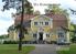 Storegårdens symmetriska entréfasad sett från nordväst. Idag inrymmer den gamla disponentvillan från år 1918 fritidsgård.